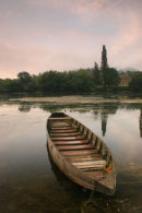 06-7433 A Misty Dawn on the Dordogne River with a Traditional Boat in the Foreground.